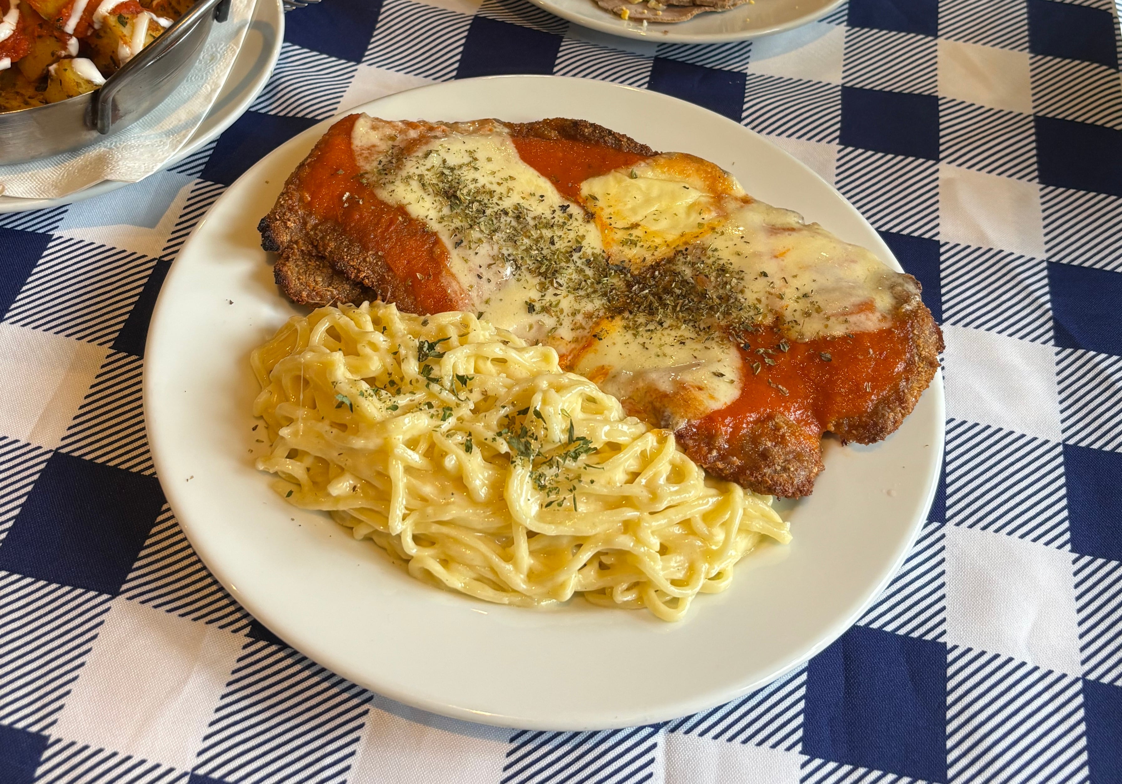 Milanesa a la napolitana con spaghetti de Ostende