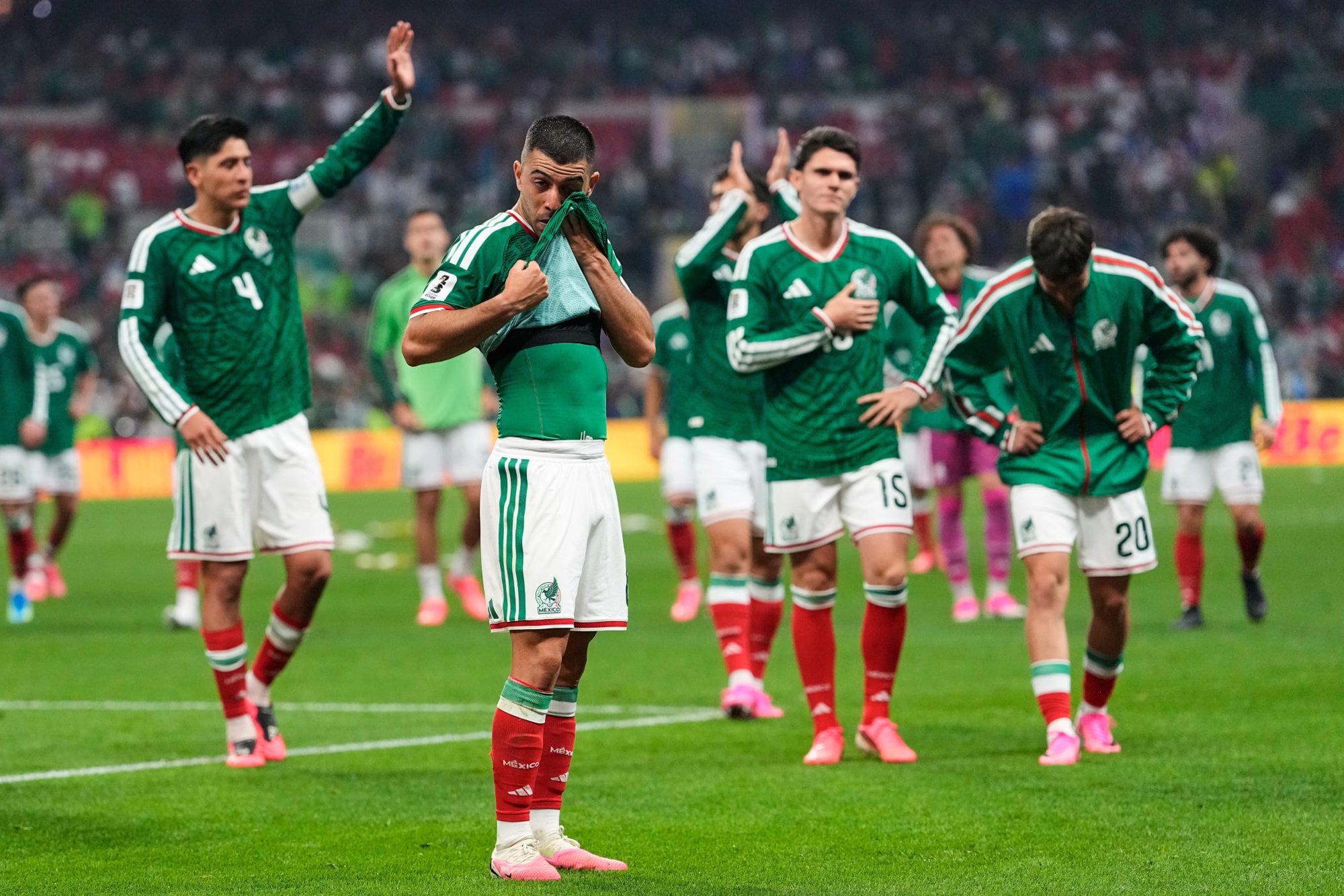 Mexico players react following the World Cup round of 16 soccer match between Mexico and England in Mexico City, Sunday, July 5, 2026. (AP Photo/Natacha Pisarenko)