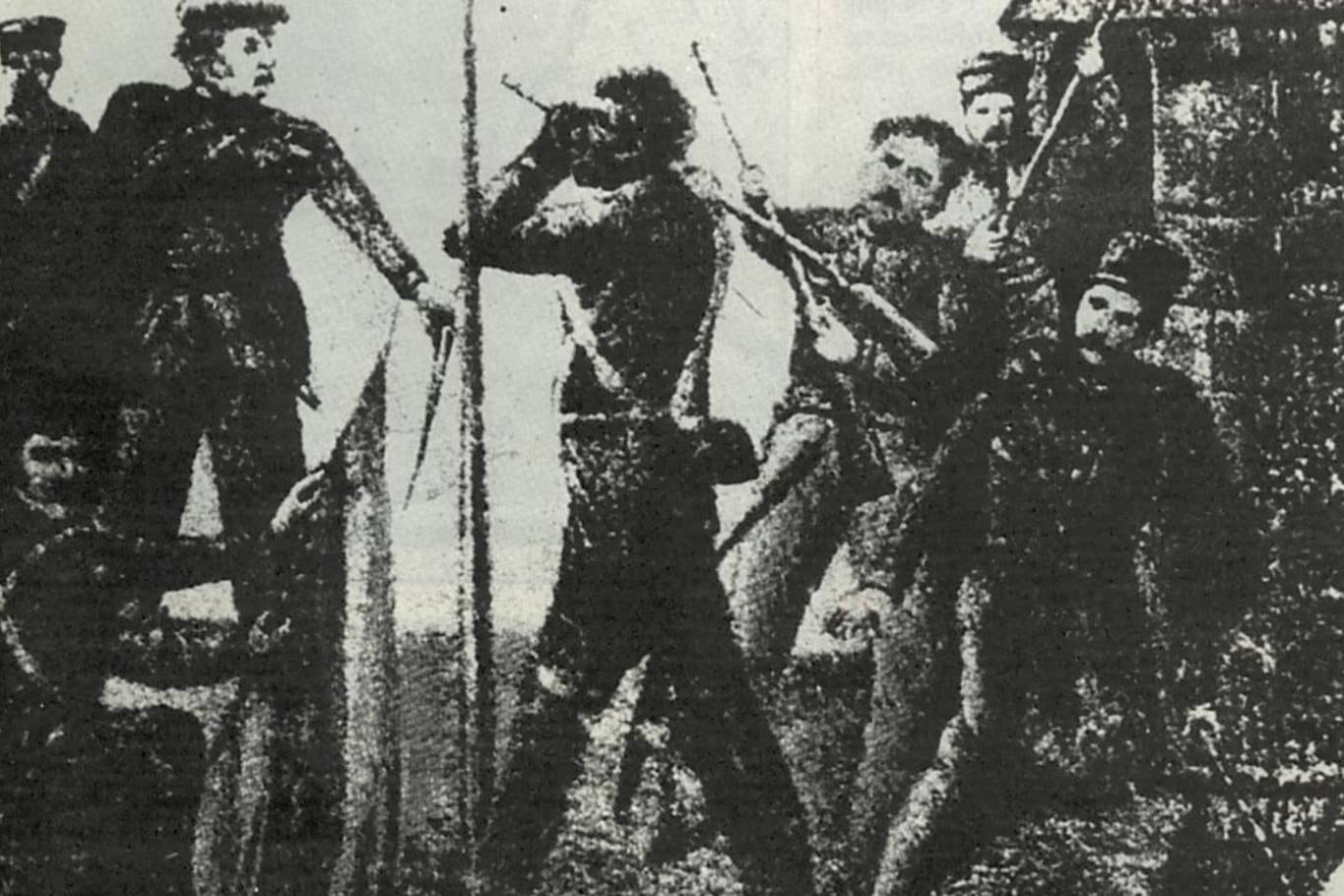 Grabado que muestra al Negro Falucho destruyendo su fusil contra el asta de la bandera como acto de reproche porque lo quisieron obligar a honrar la bandera española