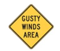 Las señales de zona de fuertes vientos alertan a los conductores sobre ráfagas capaces de desplazar vehículos