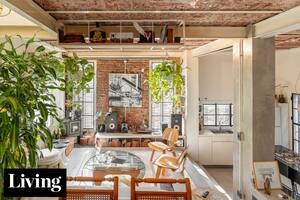 En un terreno de sólo 75m2, un arquitecto hizo crecer su casa hacia arriba y abajo.