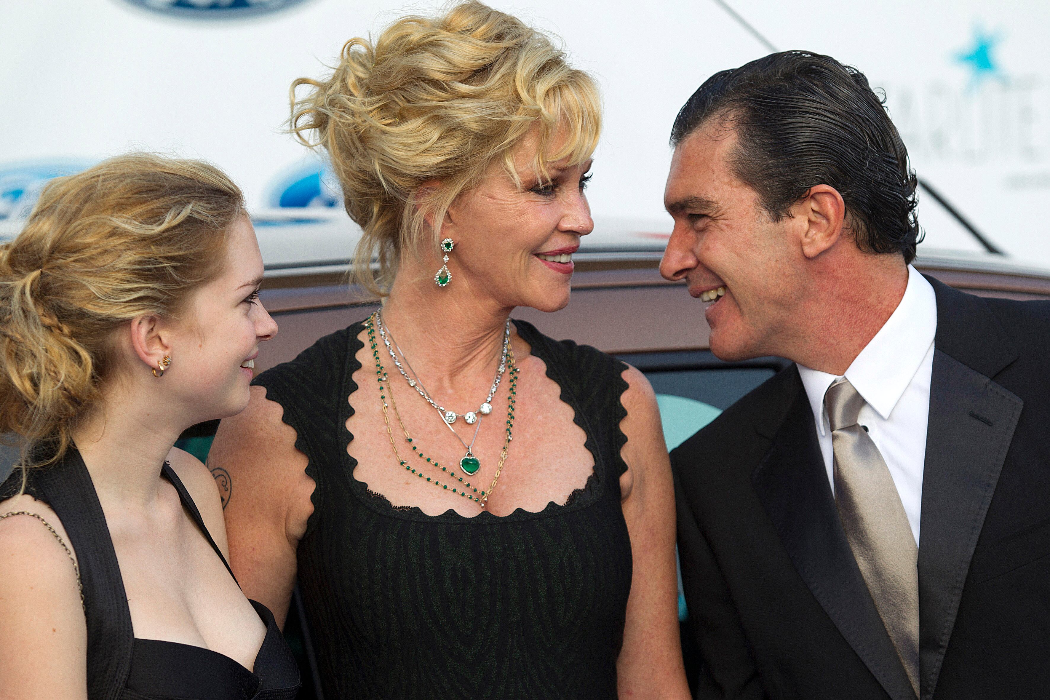 MARBELLA, SPAIN - AUGUST 04: (L-R) Stella del Carmen, actress Melanie Griffith and Antonio Banderas attend the Starlite Charity Gala 2012 on August 4, 2012 in Marbella, Spain. (Photo by Daniel Perez/Getty Images)
