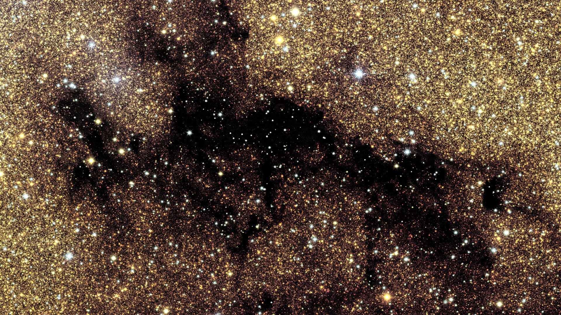 Nube molecular oscura que bloquea la luz de estrellas de fondo en el bulbo galáctico, captada en detalle por Euclid