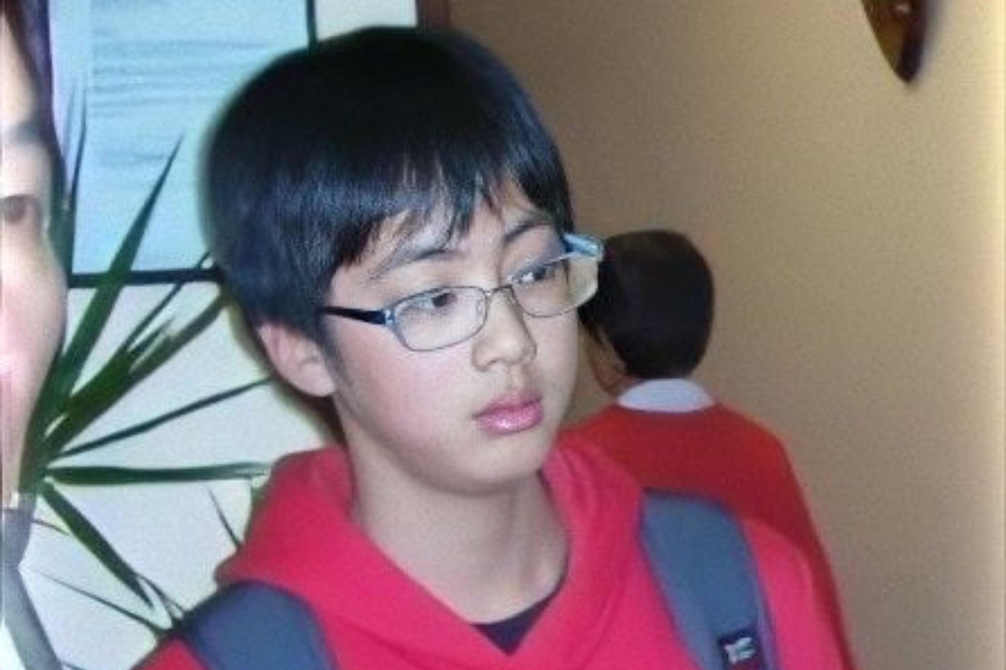 Kim Seok-Jin siendo preadolescente, durante su viaje a Australia.