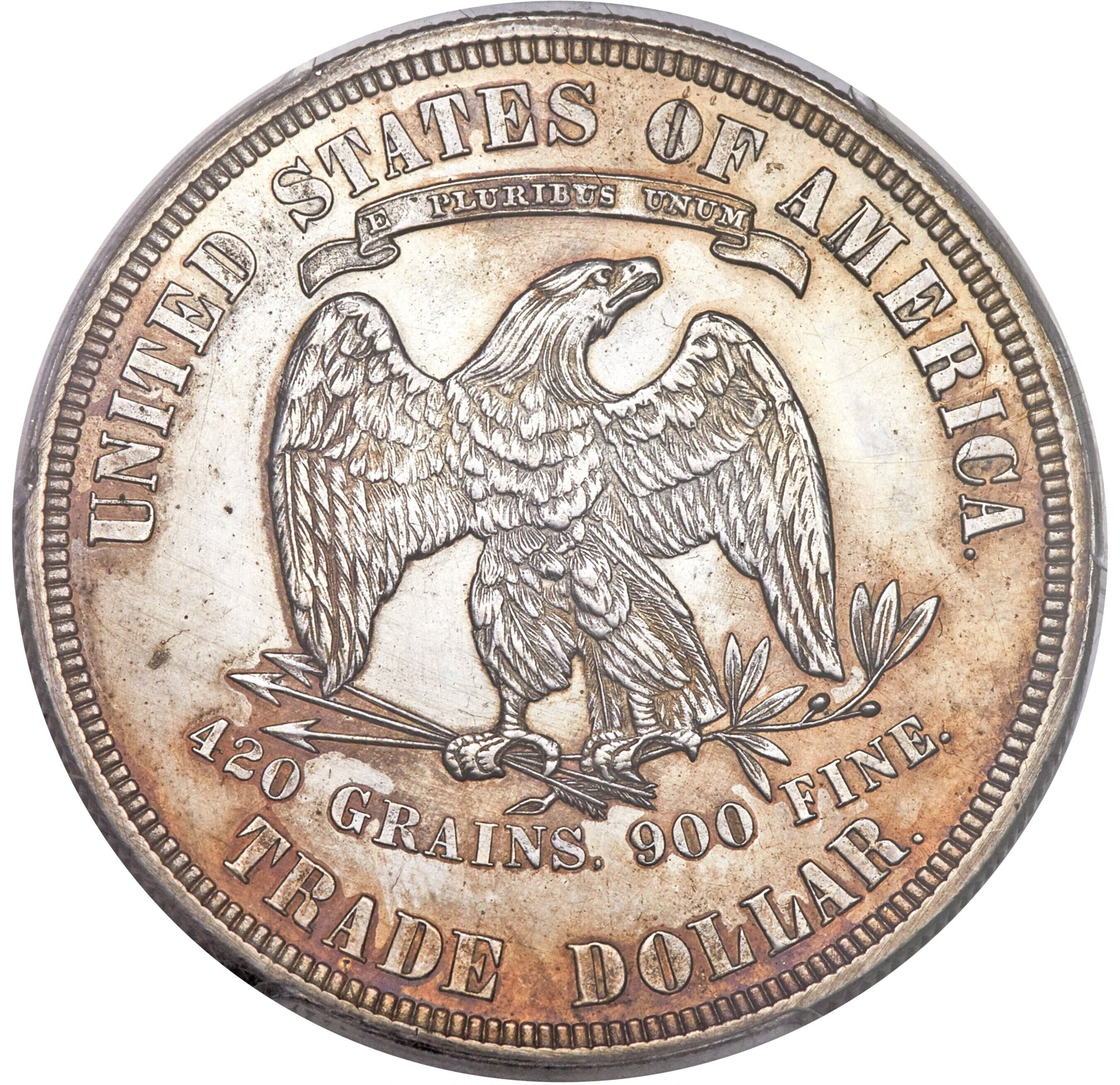 Como una de las rarezas en su diseño, en el reverso se especifica el peso y la pureza del metal