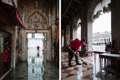A limpiar. Los estragos obligan a los venecianos a intentar, muchas veces vanamente, despejar sus casas y trabajos del agua.