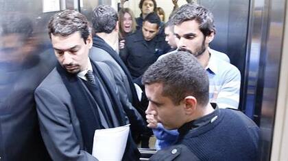 Adriana Aruj le grita a Silvoso, ya en el ascensor, escoltado por la policía y su entonces abogado Sergio Curzi