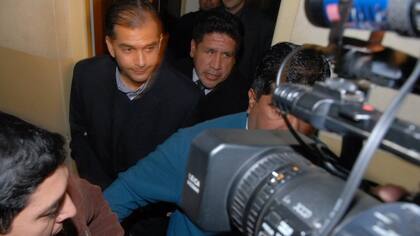 Alegre, en 2009, sale esposado de Tribunales