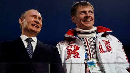 Aleksandr Zubkov junto a Vladimir Putin