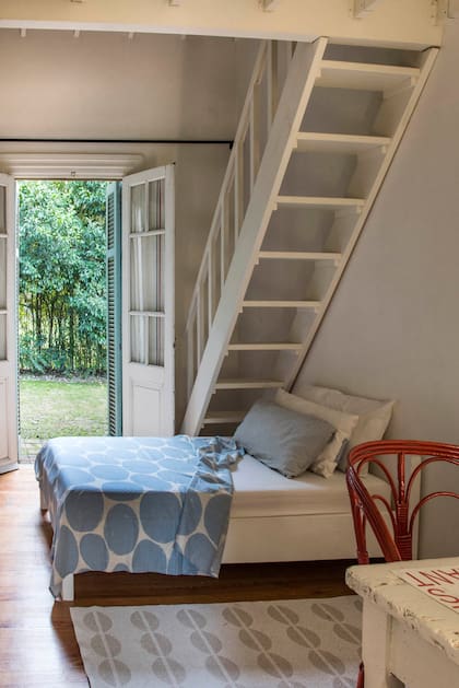 Alfombra de PVC (Nett Rugs), almohadón y tatami (ambos, Pez Punto).