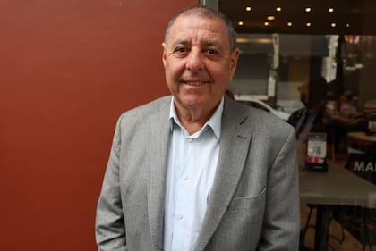 Alfredo de Angeli, al ingresar en la reunión de Pro