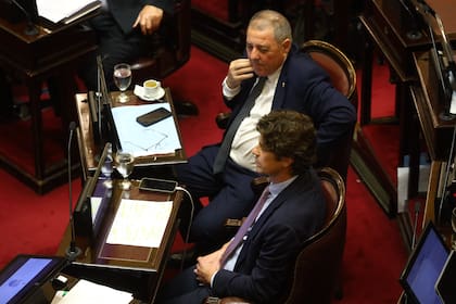 Alfredo De Ángeli y Martín Lousteau