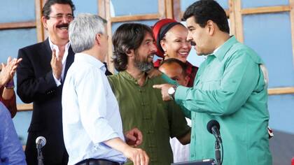 Alfredo Serrano, de 40 años, se ha convertido en un asesor económico clave de Nicolás Maduro. Aquí, en un evento en 2014