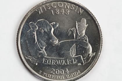 Algunas monedas de Wisconsin presentan un error de impresión por la falta de una hoja de maíz, por lo que son más valiosas para los coleccionistas
