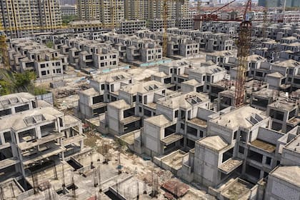 Algunos compradores dejaron de pagar sus hipotecas, que en China suelen comenzar mucho antes de que se completen las nuevas construcciones
