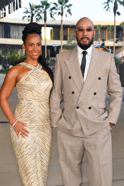 Alicia Keys
estuvo acompañada
por el rapero Swizz
Beatz. La cantante
lució un vestido
escote halter de la
colección primaveraverano 2026 de
Pamella Roland