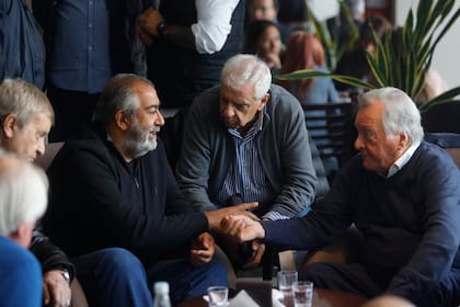 Amadeo Genta, Hector Daer, José Luis Lingeri y Luis Barrionuevo, en un viejo encuentro sindical en Mar del Plata 