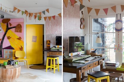 Amarillo en el escritorio, en la silla de diseño de Eames, en el mural y en la puerta que comunica con el cuarto de las chicas.