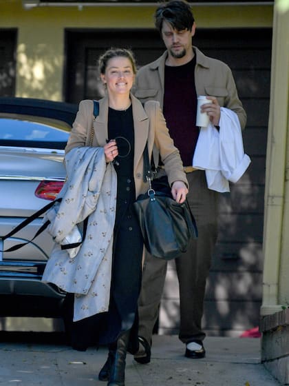 Amber Heard, muy sonriente junto a Muschietti