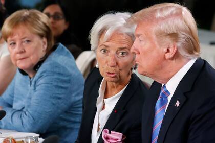 Merkel , Lagarde y Trump