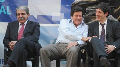 Aníbal Fernández, Gabriel Mariotto y Abal Medina durante un acto en la provincia de Buenos Aires en el 2011