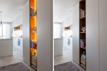 Aprovecharon el generoso acceso para un mueble hecho a medida que funciona como recibidor, con puertas, espacio de colgado y estantes con luces led, que le dan un encanto especial.