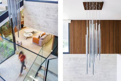 Araña ‘Lungo’ (Alvar Iluminación). Pisos de Travertino sin taponar con pulido mate.