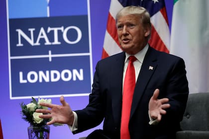 ARCHIVO - El presidente estadounidense Donald Trump se reúne con el primer ministro italiano Giuseppe Conte durante una cumbre de la OTAN el miércoles 4 de diciembre de 2019, en Watford, Inglaterra. (AP Foto/ Evan Vucci, Archivo)