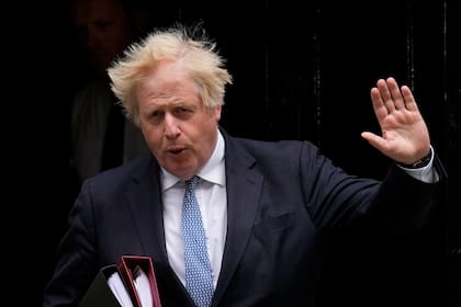 ARCHIVO - El primer ministro británico Boris Johnson se dirige a una reunión en el Parlamento, en Londres, el 25 de mayo de 2022. (AP Foto/Matt Dunham, archivo)