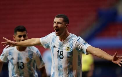 Argentina's Guido Rodriguez celebrates after scoring his side's opening goal against Uruguay during a Copa America soccer match at the National Stadium in Brasilia Brazil, Friday, June 18, 2021. (AP Photo/Eraldo Peres)