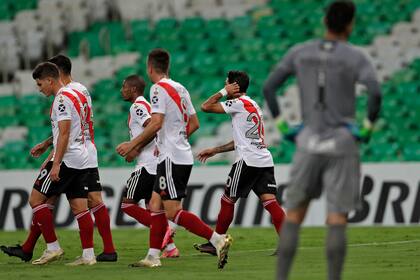 Argentina's River Plate Gonzalo Montiel (2-R) celebrates after scoring a penalty kick during the Copa Libertadores football tournament group stage match between Brazil's Fluminense and Argentina's River Plate at Maracana Stadium in Rio de Janerio, Brazil, on April 22, 2021.