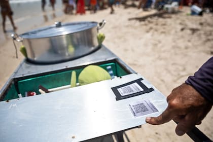 Argentinos usan efectivo o billeteras virtuales para pagar sus gastos de vacaciones en brasil.