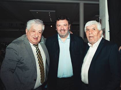 Ariel Lijo, con los sindicalistas Julio Piumato y Hugo Moyano