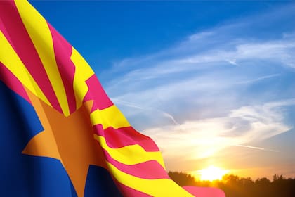 Arizona state of United States flag against the sunset