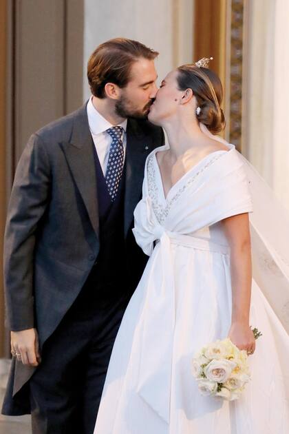 Aunque primero la besó tímidamente en la frente, finalmente Philippos le dio a su mujer el beso que todos pedían.