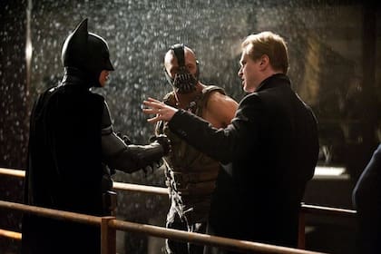 Bale confía en la visión que tiene de Batman Christopher Nolan (de espaldas en la foto) y por eso quiere que el director apruebe su participación en la película The Flash