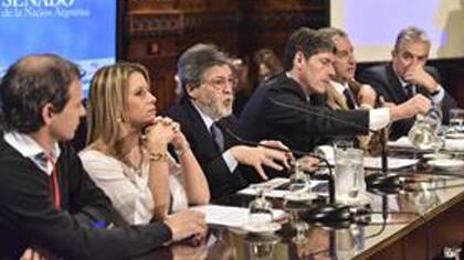 Balestrini junto a Abad, y Abal Medina