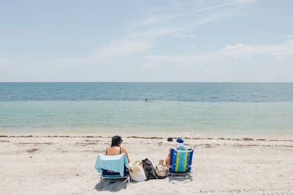 Bañitas en una ola de calor en Key Biscayne Beach, Florida, en julio de 2023. (Alfonso Duran/The New York Times)