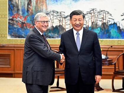 Bill Gates y Xi Jinping, durante un encuentro en Pekín 