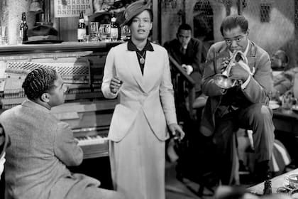 Billie Holliday, con Louis Amstrong