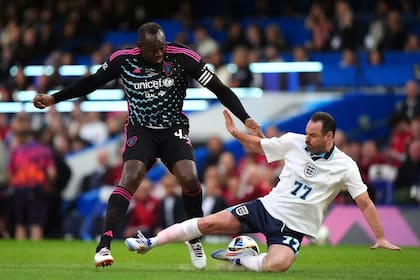 Bolt en acción, durante el enevto benéfico Football aid