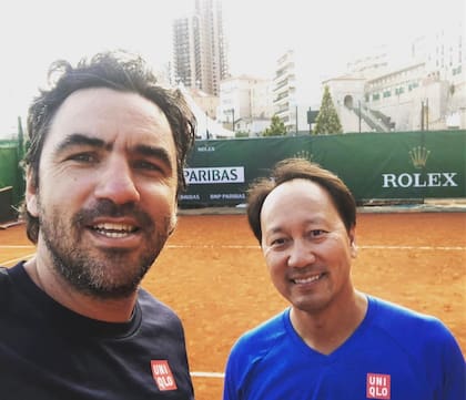Bottini junto con Michael Chang, cuando compartió tareas de entrenador de Nishikori con el estadounidense 
