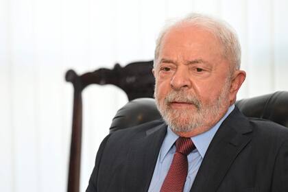 Brazil's President Luiz Inacio Lula da Silva attends a bilateral meeting with Ecuador's President Guillermo Lasso (out of frame) in Brasilia on January 2, 2023. - Luiz Inacio Lula da Silva took office on January 1, 2023 for a third term as Brazil's president, vowing to fight for the poor and the environment and "rebuild the country" after far-right leader Jair Bolsonaro's divisive administration. (Photo by EVARISTO SA / AFP)