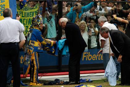 Cacho, junto a Bianchi