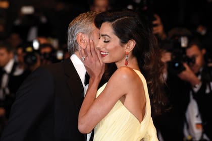 CANNES, FRANCE - MAY 12:  Actor George Clooney and his wife Amal Clooney attend the "Money Monster" premiere during the 69th annual Cannes Film Festival at the Palais des Festivals on May 12, 2016 in Cannes, France.  (Photo by Clemens Bilan/Getty Images)