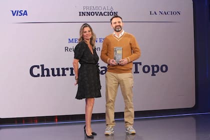 Carla Quiroga, prosecretaria de LA NACION y Manuel Navarro, socio y gerente Churrerías El Topo
