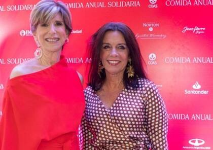 Carolina Barros, jefa de comunicación de Corporación América, con Ani Mestre en una de las cenas anuales