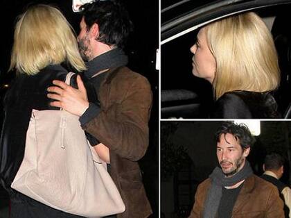 Charlize y Keanu, sorprendidos por los flashes