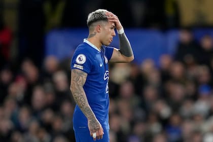 Chelsea's Enzo Fernandez reacts during the English Premier League soccer match between Chelsea and Fulham at Stamford Bridge stadium in London, Friday, Feb. 3, 2023. (AP Photo/Kirsty Wigglesworth)