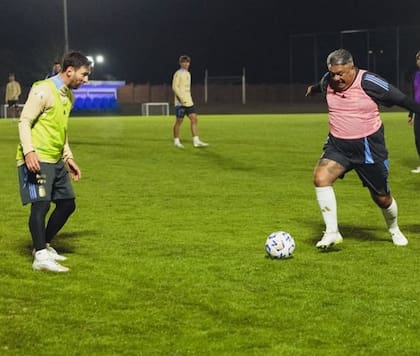 Chiqui Tapia y Lionel Messi